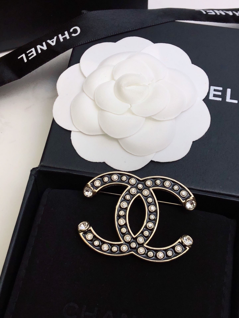 Ch**el brooches